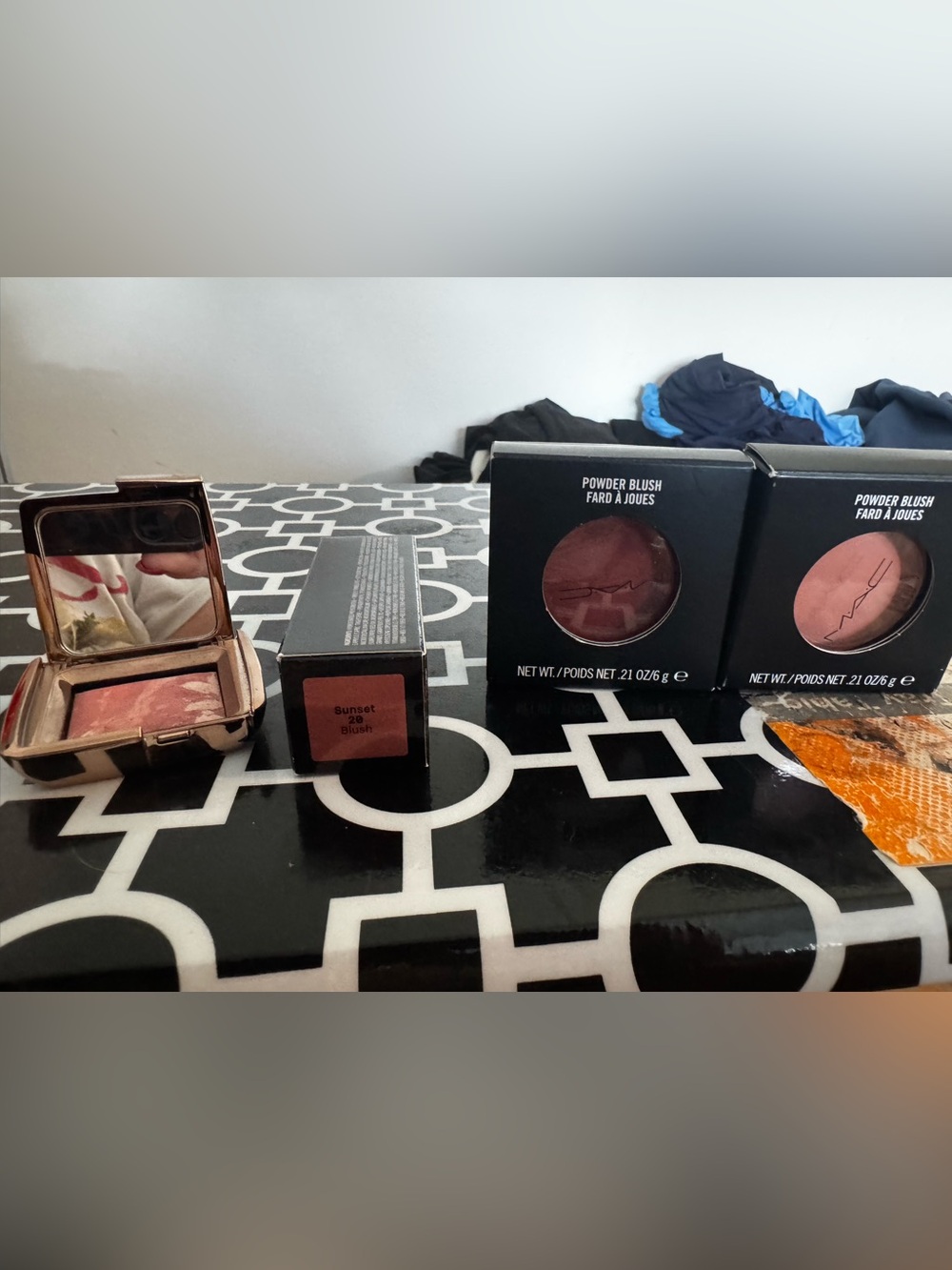 4 blushes - 2 Mac powder, hourglass powder and bobbi brown cream